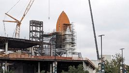 Endeavour's Space Shuttle Stack stands tall at the construction site for the Samuel Oschin Air and Space Center...on May 23, 2024.