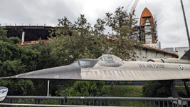 With the retired A-12 Blackbird in the foreground, Endeavour's Space Shuttle Stack stands tall at the construction site for the Samuel Oschin Air and Space Center...on May 23, 2024.