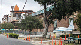 With a NASA T-38 Talon in the foreground, Endeavour's Space Shuttle Stack stands tall at the construction site for the Samuel Oschin Air and Space Center...on May 23, 2024.