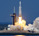 A SpaceX Falcon Heavy rocket carrying Europa Clipper lifts off from Launch Complex 39A at NASA's Kennedy Space Center in Florida...on October 14, 2024