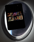 An electronic tablet carrying the photos of me and other 'My Face In Space' participants floats around inside the cabin of Crew Dragon Resilience during the Polaris Dawn mission